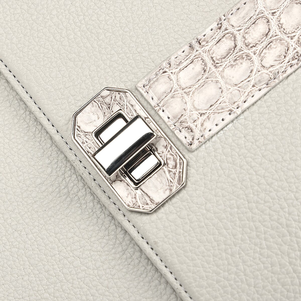 Bolso satchel en piel genuina de nilóticus para dama
