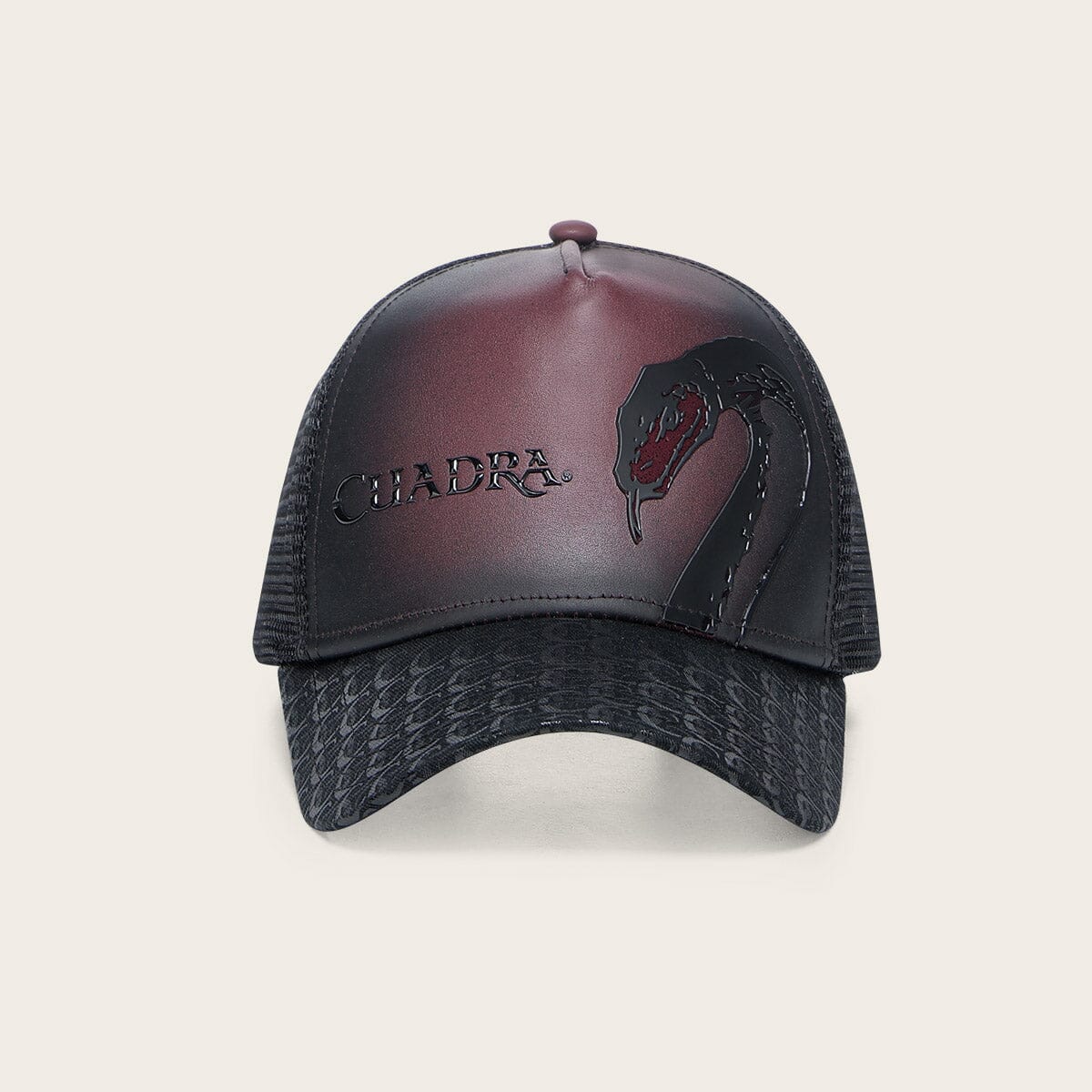 Gorra en piel genuina con diseño de pitón